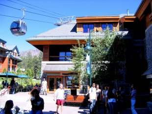 Heavenly lifts in background of Plaza with Wolfgang Puck Express Cafe